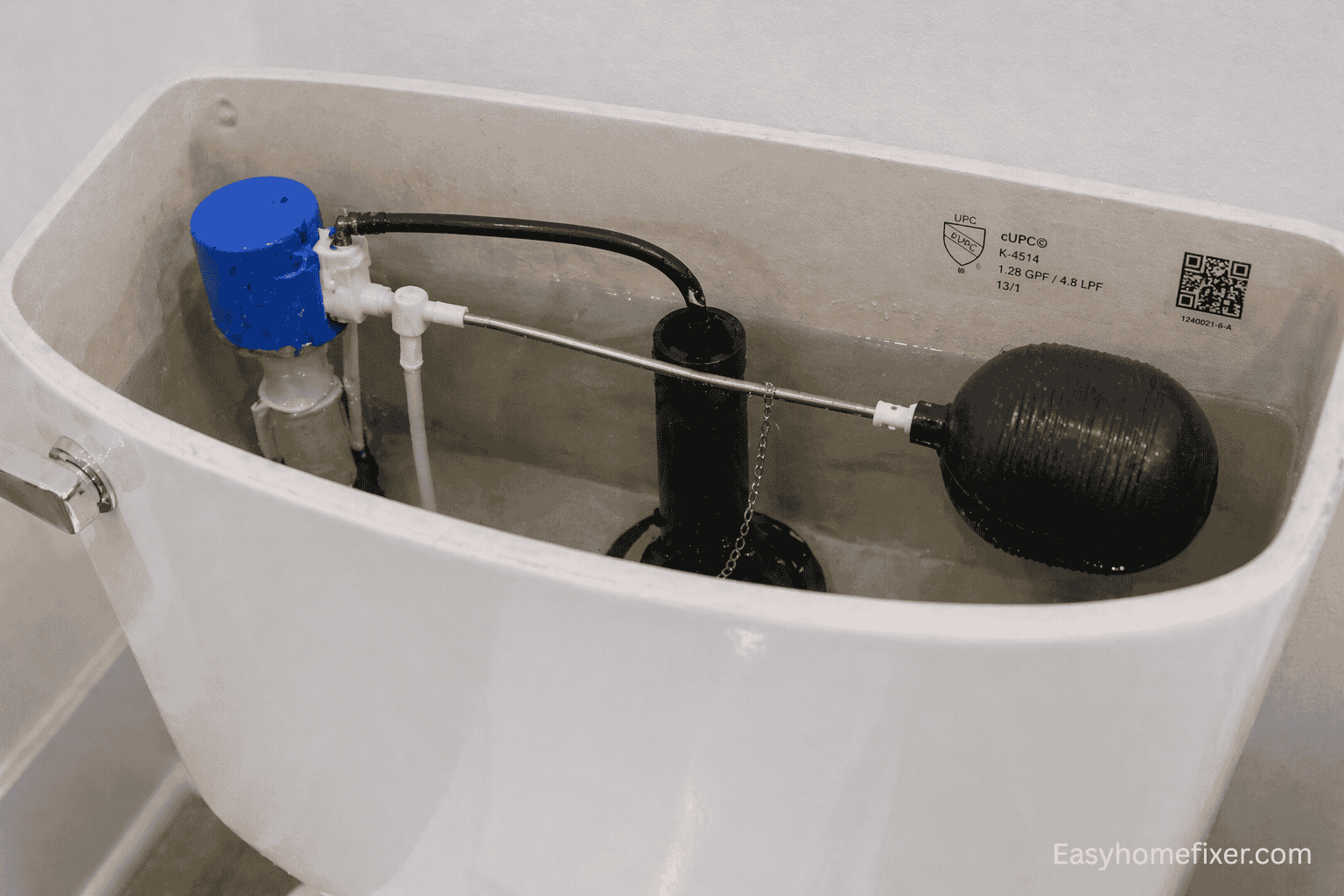 Water flowing into overflow tube inside toilet tank